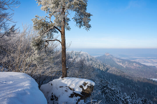 Germany, Baden Wurttemberg, Zollernalb, Winter mountain landscape with Hohenzollern Castle