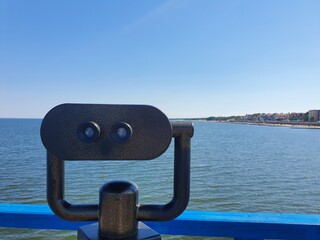 telescope overlooking the sea