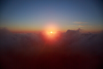 High view of the mountains and view down to the sea, mountains and sunset