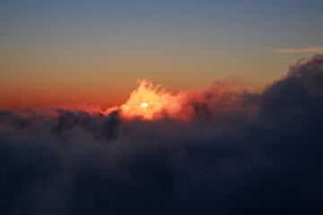 High view of the mountains and view down to the sea, mountains and sunset