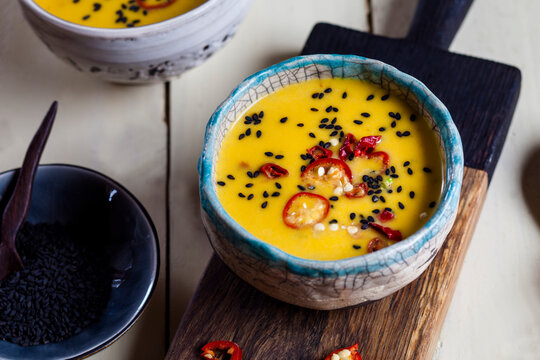 Vegan creamy pumpkin soup with chilies