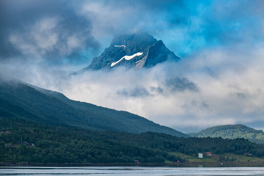 Mountain looking through fog at Kystriksveien, Norway 