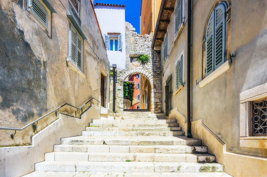 Narrow alley with stone stairs at Rovinj, Istria, Croatia