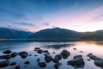 New Zealand, Tasman District, Scenic view of Lake Rotoiti at moody sunset