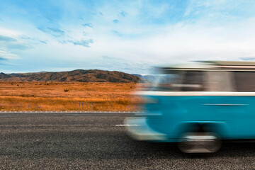 Blurred motion of bus driving along State Highway 8