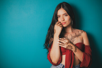 Portrait of a girl tattooed with hindu henna