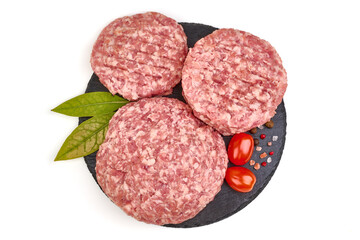 Burger patties, ready to fry, burger cutlets, isolated on white background. High resolution image.