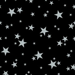 Seamless pattern with silver stars on black background. Festive design.