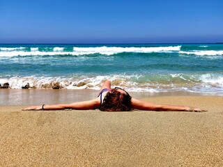beautiful sea ocean beach photo woman, girl laying on the beach 