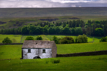Traditional whitewashed barn in Upper Teesdale, County Durham, England, in spring