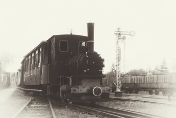 a photo of the narrow-gauge railway, stylized as an old photograph 