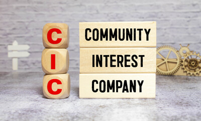 Community Interest Company - CIC on wooden block