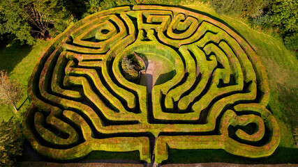 Naklejka premium Aerial view Panoramic view of a Celtic maze in Wicklow, Ireland.maze in the grass