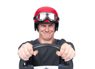 Emotional smiling man in red motorcycle helmet holding steering wheel, isolated on white...