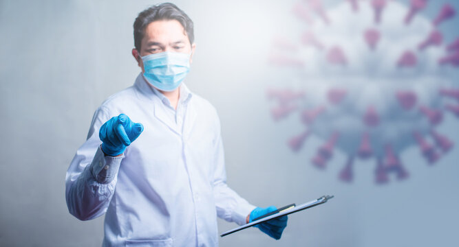 Doctor touch on technological digital futuristic HUD interface with corona virus(covid-19). Innovative in science and medicine concept.