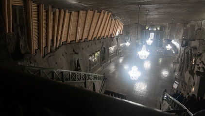 Illuminated underground active Chapel of Saint Kinga in medieval salt mine in Wieliczka, Poland