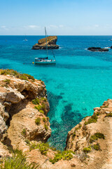 rocky beach with blue water