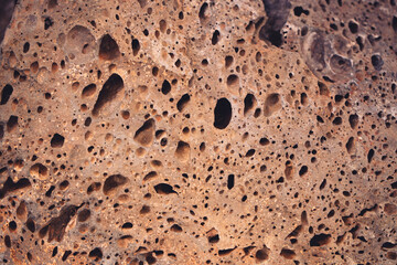 Close up detail of volcanic lava rock basalt found in the desert