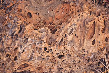 Close up detail of volcanic lava rock basalt found in the desert