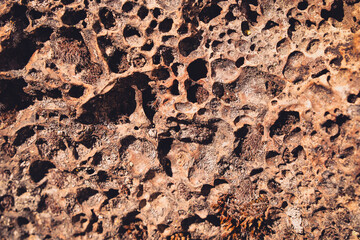 Close up detail of volcanic lava rock basalt found in the desert