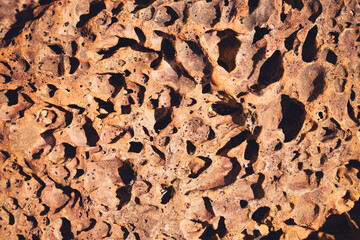 Close up detail of volcanic lava rock basalt found in the desert