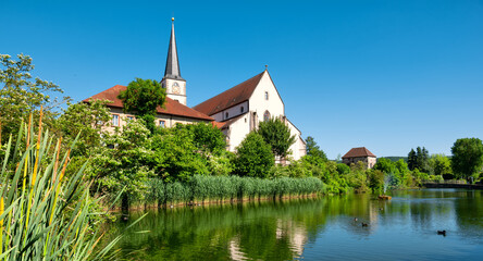 Pond with view of the Catholic Parish Church in Hammelburg- Bavaria