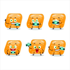 Photographer profession emoticon with jelly sweets candy orange cartoon character. Vector illustration