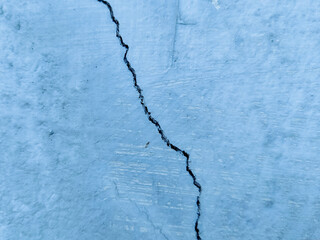 Close-up of an old wall with cracks.