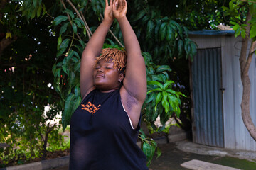 person in the garden stretching 