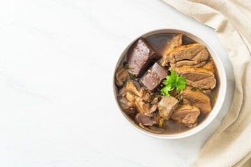 Pot-stewed ducks or Steamed duck with soy sauce and spices