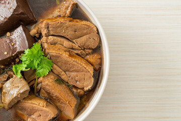 Pot-stewed ducks or Steamed duck with soy sauce and spices