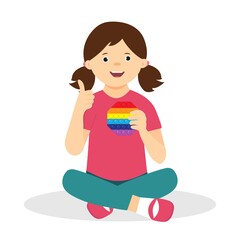 The cute girl holds a colorful antistress toy in his hands. Happy, smilling kid.Handmade toy with bubbles for children. Touch fidget in rainbow colors. Vector illustration