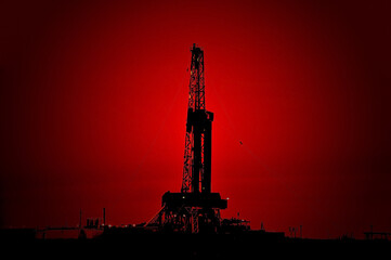 The drilling rig during sunset