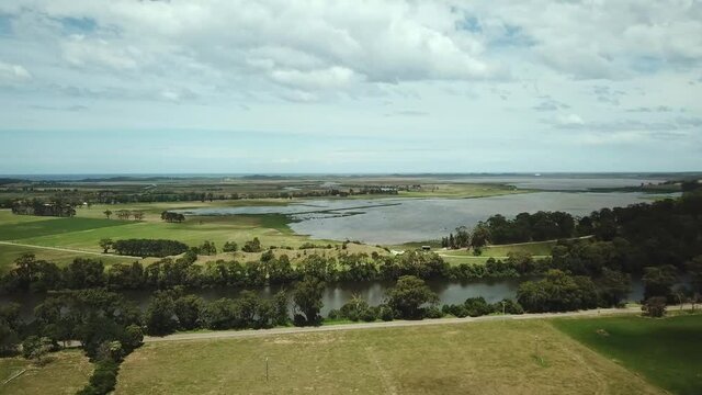 Aerial footage of the Snowy River and adjacent Lake Wat Wat near Marlo, in Gippsland, Victoria, Australia, December 2020