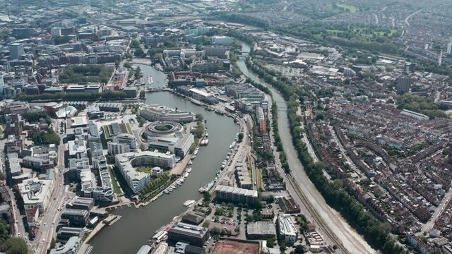 Dolly forward drone shot over Bristol Harbour sunny day