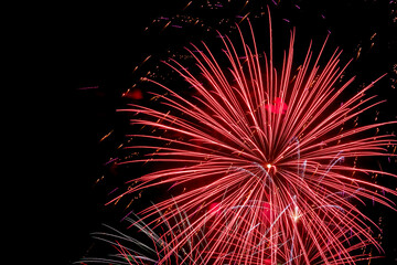 Fireworks in night sky, to celebrate a holiday, seasonal or special event.