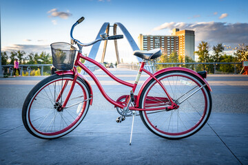 Calgary Alberta Canada, May 30, 2021: A vintage ladies cruiser bicycle parked on a downtown pathway...