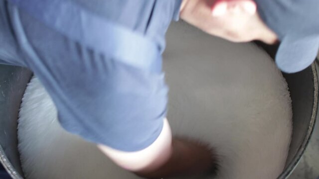 Man hand holding and mixes PP Pet Chips Semi Dull, PET chips recycle, PET polyester chips