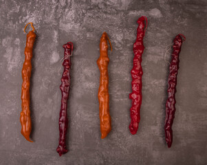 Georgian churchkhela on a dark background close-up
