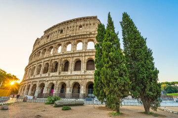 Fototapeta na wymiar Colosseum in Rome at sunrise. Italy