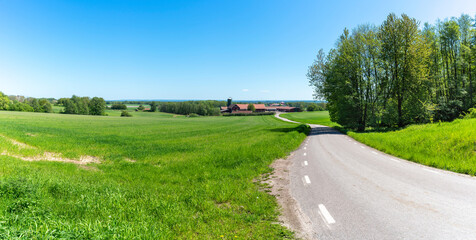 Idyllic Asphalt Country road in agricultural landscape