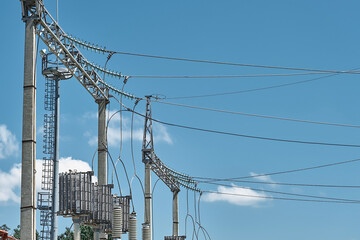 High voltage electrical transformers in an electricity distribution power plant. High voltage power...