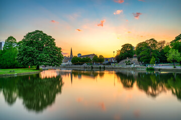 Obraz premium Great Ouse River overlooking tower of St Paul's church at sunset in Bedford. England 