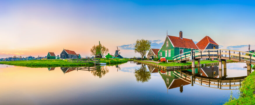 Zaanse Schans windmill village at sunset in Netherlands 