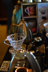 Fototapeta na wymiar hands drip coffee set in the coffee shop
