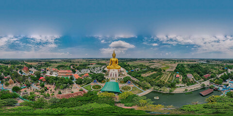 360 degrees panorama aerial view of big ancient golden mediated Buddha at Wat Muang Temple, Ang...