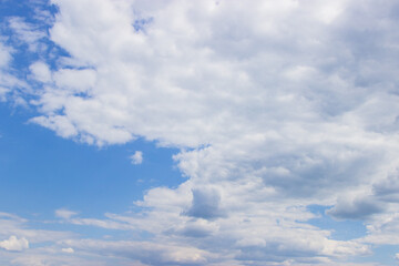 clouds float across the sky