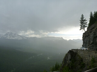 Moody mountain view at Glacier National Park on a cloudy and stormy day