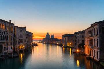 Beautiful sunrise view of Grand Canal and Basilica Santa Maria della Salute in Venice, Italy