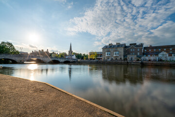 Bedford bridg on the Great Ouse River with St. Paul's church tower 